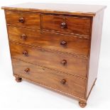 A 19thC mahogany chest, of two short and three long cock beaded drawers, each with knob handles on b