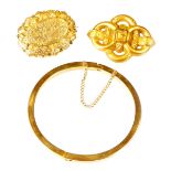 Various jewellery, a bangle of plain circular form 7cm diameter, a lozenge shaped belt buckle brooch