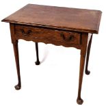 An early 19thC and later oak lowboy, the moulded top raised above a frieze drawer, on turned legs, t