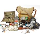 A Hardy fishing bag, containing a quantity of various fishing equipment, fishing ties, small cosh, v