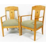 A pair of Swedish birch carver chairs, each with heavy shaped cresting rails, Queen Anne style splat