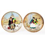 A pair of Royal Doulton wall plates, The Old Balloon Seller and The Balloon Man, D6655, printed mark