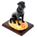 A Royal Doulton boxed figure of a black Labrador, RDA13 printed marks beneath, 14cm high. (boxed)