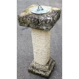 A modern sun dial, with square top, metal central section, textured column and stepped base, 96cm hi