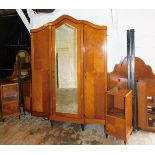 An early 20thC Dutch style walnut bedroom suite, comprising single mirrored wardrobe, mirror back dr