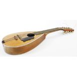 A 20thC La Foley seven string mandolin, of shaped form, with eight tuning knops, with London label,
