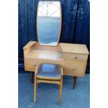 A 20thC retro teak mirror back dressing table, with one short and one long drawer, on turned legs, 1