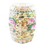 A 20thC Chinese pottery barrel seat, of hexagonal form with a pierced top, profusely decorated with
