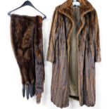 A 20thC ladies fur coat, three quarter length, and two various stoles, size unknown.