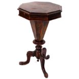 A 19thC walnut conical work table, the octagonal top raised on a shaped stem, terminating in triple