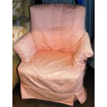 An early 20thC armchair in later floral material, 71cm wide.