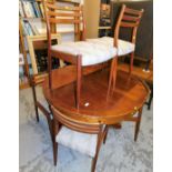 A Grange furniture yew wood finish dining room table, with extending circular top, (when closed) 78c