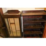 A mid 20thC mahogany finish display cabinet, 135cm high, 60cm wide, 32cm deep, and a set of open boo