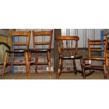 A pair of elm kitchen chairs with triple ring turned front legs, 83cm high, a further spindle back c