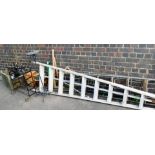 A folding step ladder, 168cm high, another, pickaxe, lead cistern wine rack, various garden planters