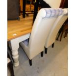 A large beech topped kitchen table, on painted turned legs, 80cm high, 150cm wide, 95cm deep, and th