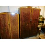 An early 20thC three piece bedroom suite, comprising large two door wardrobe, 195cm high, 121cm wide