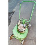 A Briggs and Stratton lawnmower in green, 55cm wide.