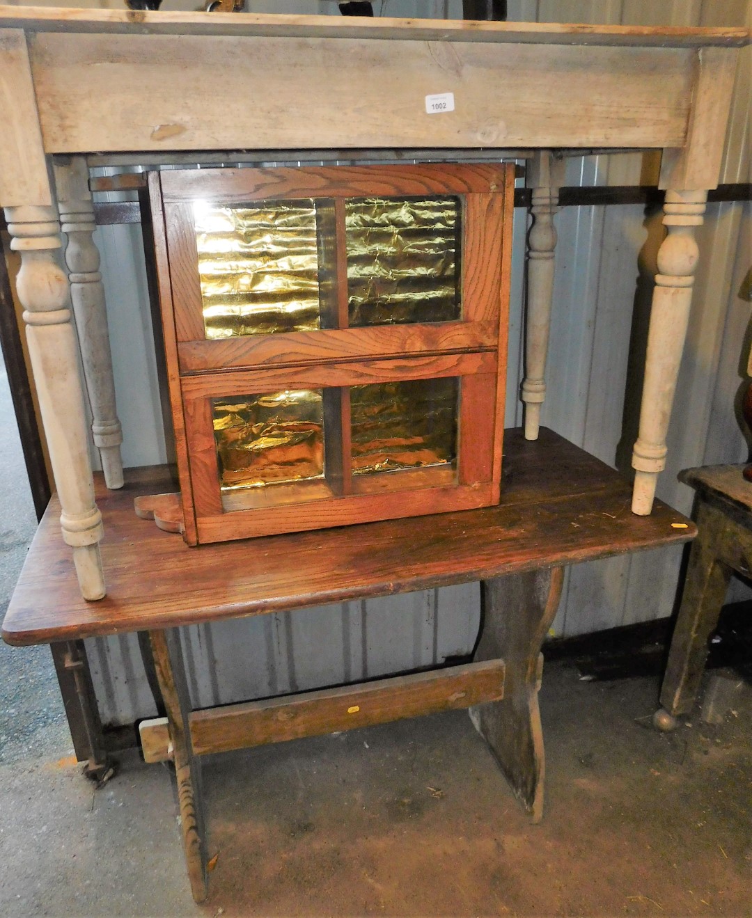 A 19thC pine plank top kitchen table on turned legs, 103cm wide, hanging cupboard and a further tabl