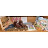 Work boots, pictures, prints, decorative wall hangings, etc. (1 shelf)