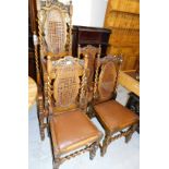 A set of five (4+1) 20thC oak Carolean style bergere dining chairs, each with drop in seats in brown