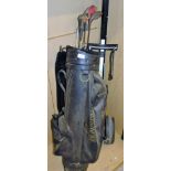 A Howson golf bag, with vintage golf clubs, wooden headed drivers, caddy car, etc., the golf bag 98c