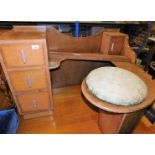 An unusual oak mirror back dressing table with fixed circular stool seat and three drawers, 70cm hig