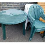 Five garden plastic patio stacking chairs, in white, and a green plastic patio set, comprising four