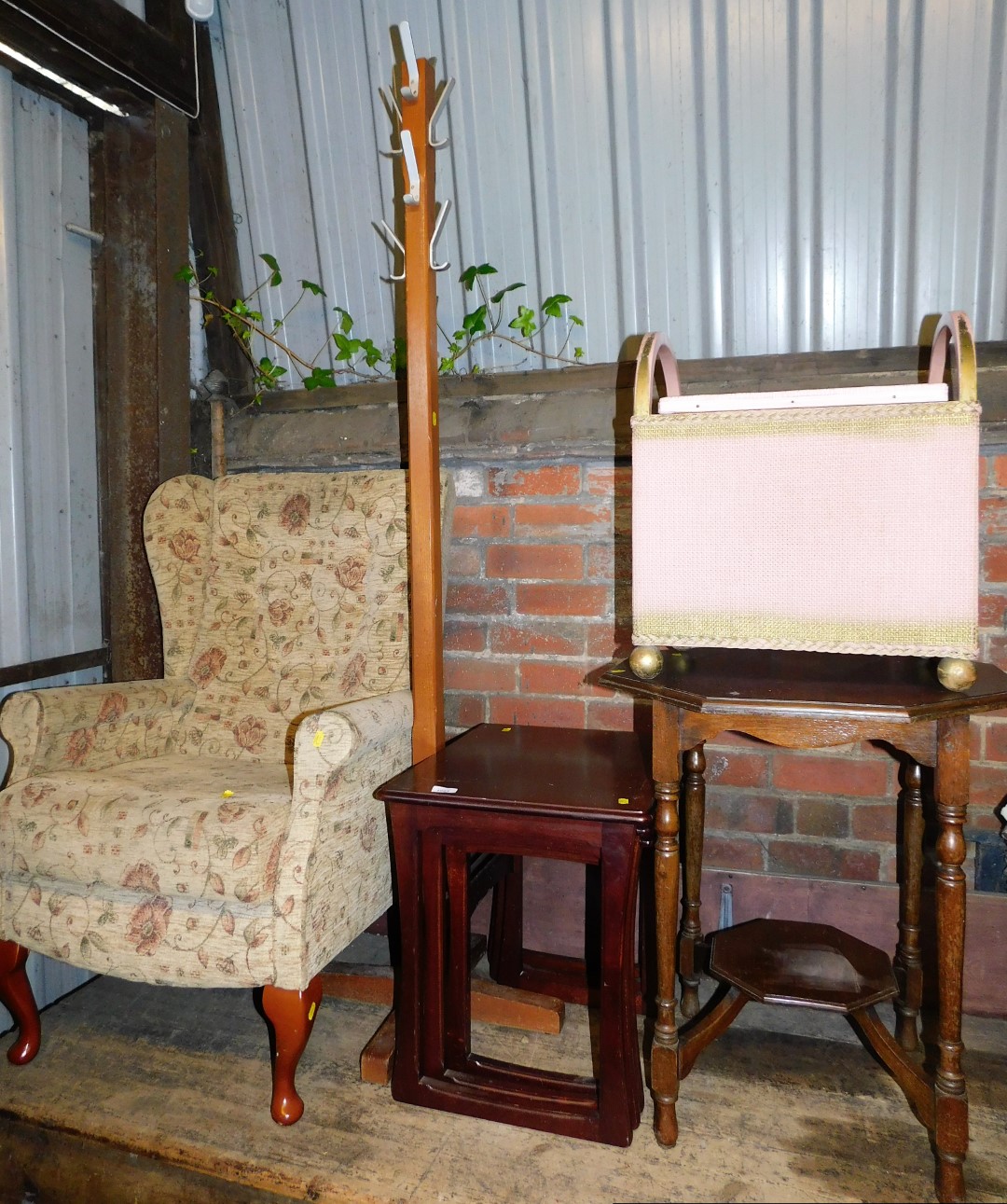 A retro teak finish nest of three tables, the largest, 52cm high, 43cm wide, 54cm deep, window table