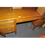 A 1920s oak desk, 75cm high, 150cm wide, 97cm, deep.