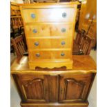 A yew wood finish chest, of four long drawers on bracket feet, of small proportion, 61cm high, 48cm