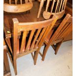 An early 20thC oak drawer leaf dining table, (when closed) 80cm high, 88cm wide, 93cm deep and four