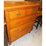 An early 20thC oak chest, of two short and three long drawers, with pierced plate back handles, 102c