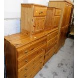 Various pine bedroom furniture, comprising a two door wardrobe, two pedestal cabinets, two chests of