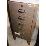 A set of metal filing drawers, 65cm high, 42cm wide, 42cm deep.