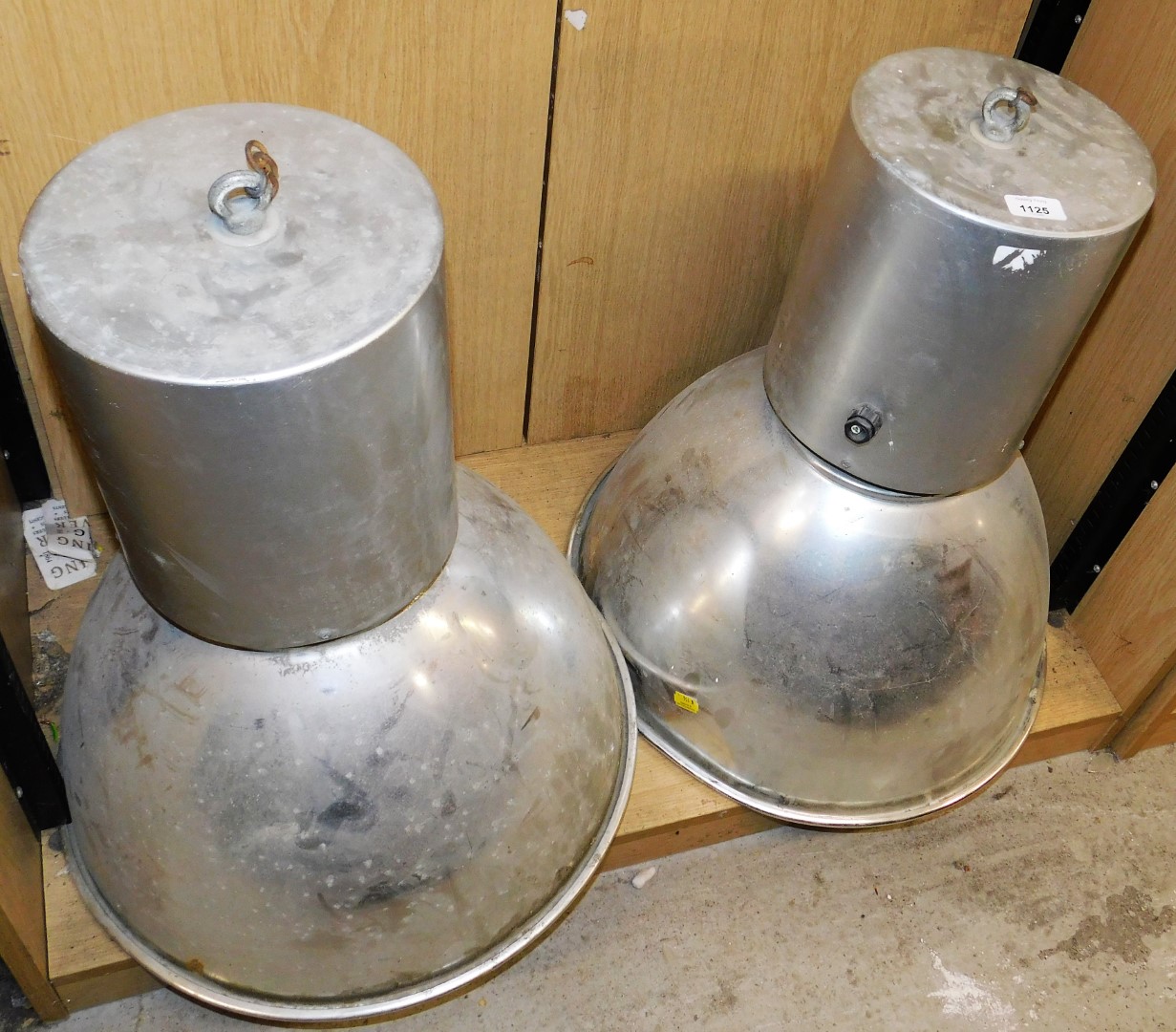 Two chrome cased heavy duty foot lights, 62cm high, 53cm diameter.