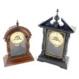 Two German Junghans late 19thC mantle clocks, one in an ebonised and parcel gilt case, the other