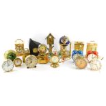 A quantity of alarm, carriage and other clocks, to include a novelty globe shaped clock combined