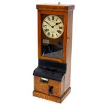 A National Time Recorder Company clocking in clock, the painted dial with Roman numerals in an oak