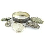 A group of silver and other jewellery, comprising a silver bangle with leaf decoration, a silver