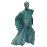 An Austin products composition bronze effect oriental figure, impressed mark to base, 87cm high.