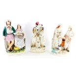 19thC Staffordshire figures, comprising a spill vase set with two figures and vase on a bocage