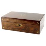 A late 19thC rosewood writing box, inlaid with brass and mother of pearl, the hinged lid enclosing a
