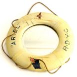 A novelty shipping related wall mirror, modelled in the form of a life buoy, titled Ariel R.D.Y.C,