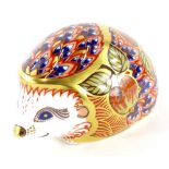 A Royal Crown Derby orchard hedgehog paperweight ornament, gilt stopper, printed marks beneath, 10cm