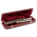 A silver plated Piccolo, stamped Lark Shanghai, M4007 in a fitted case.