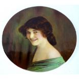 A 1930s porcelain plaque, painted with a portrait of a young lady, by James Edwin Dean, 25cm