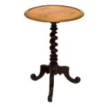 A Victorian mahogany occasional table, the circular dished top on a spirally turned column and