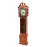 A late 20thC/early 21stC oriental hardwood cased longcase clock, the arch dial with moon phase,