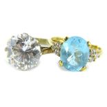 Two dress rings, comprising a 9ct gold aquamarine and CZ dress ring, with central aquamarine and